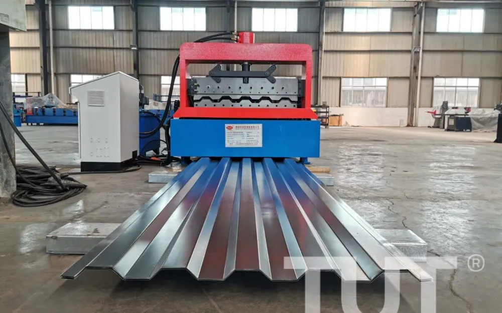 Roll forming line discharging a corrugated steel roof panel onto the run-out table