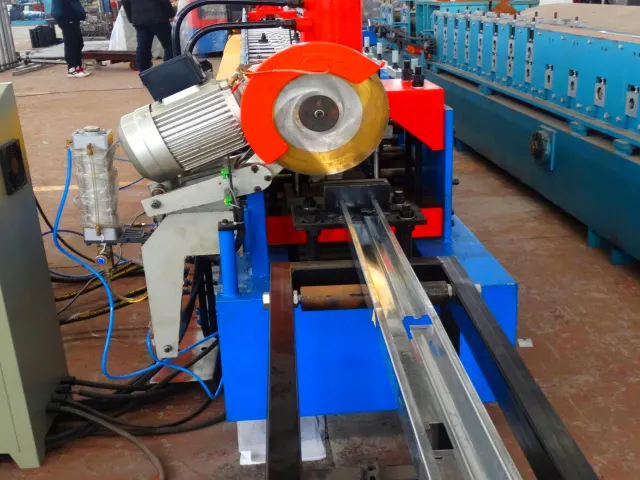 Door frame roll forming machine with punching and cutting station