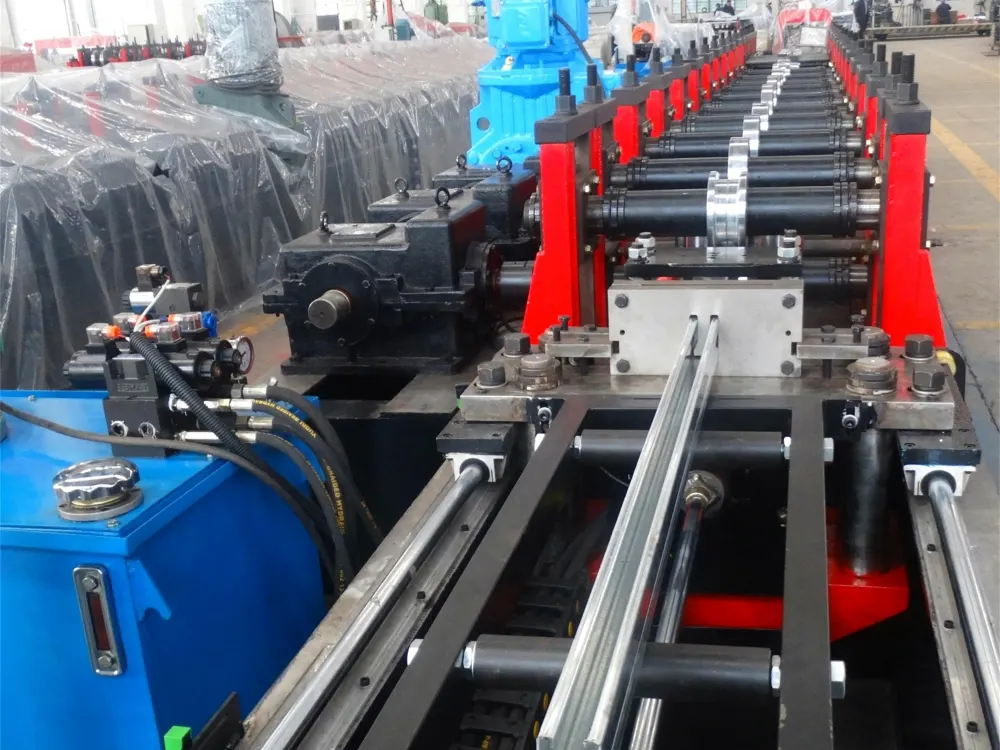 Roll forming stations and roller shafts configured for a custom steel profile